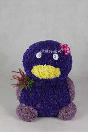 花偶企鹅与勿忘我干花 融合创意与真情的礼品花卉新选择